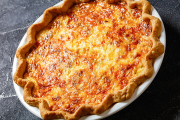 quiche with cheese and bacon filling, top view