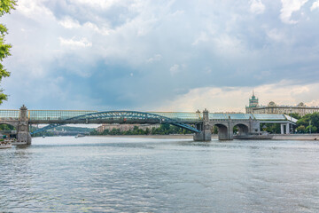 Fototapeta premium View of the Moscow river embakment, Pushkinsky bridge and cruise ships at sunset.