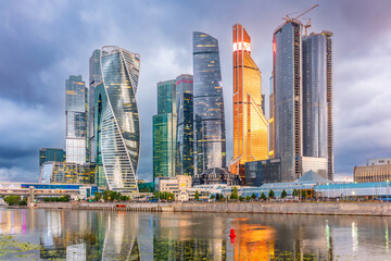 Plakat High buildings of Moscow-City at Moskva River at summer sunset, Russia.