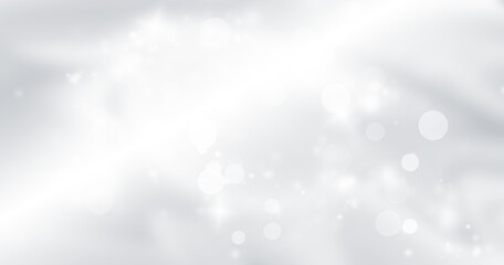 abstract white cicle bokeh on gray blurred backdrop, shristmas glow pattern background. soft light magic effect shine wallaper.