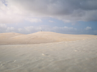 Lone Person on Sand Dune