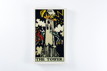 Tarot cards, Rider Waite tarot cards, the tower vintage card in the foreground.
