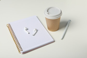 Concept of freelance, composition with hot drink and headphones