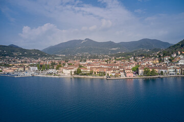 View of the historic part of Salò on Lake Garda Italy. Tourist site on Lake Garda. Lake in the mountains of Italy. Aerial view of the town on Lake Garda.