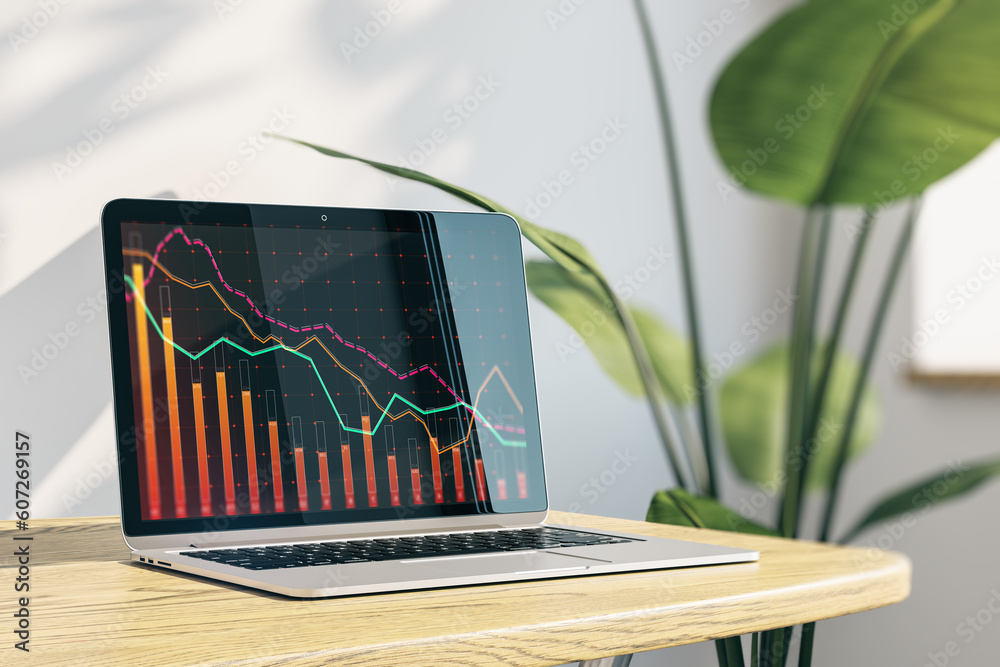 Poster close up of laptop on wooden desk with downward red crisis chart grid on concrete wall background wi