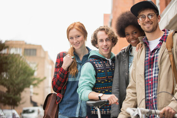 Friends smiling together on city street