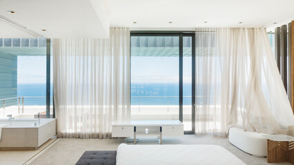 Fototapeta na wymiar Modern bedroom overlooking ocean