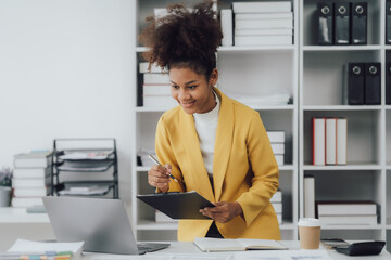 african american business woman working in her office accountant concept finance analysis business report graph chart financial financial chart corporate economy, banking, market research