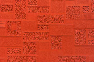 Bush-hammered concrete facade surface as background