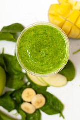 apple spinach smoothie on a background