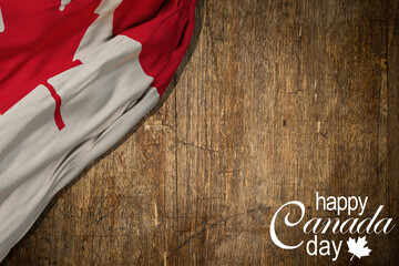 Happy Canada Day Greeting Card. Calligraphic Text and Canadian Flag Color on black background. Vector Illustration. 