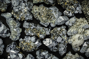 Galena and pyrite macro detail texture background. close-up raw rough unpolished semi-precious...