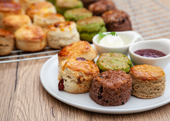 Five flavour of scone, chocolate, butter, cranberry, Earl grey, Matcha, served with clotted cream and raspberry jam. 