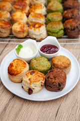 Five flavour of scone, chocolate, butter, cranberry, Earl grey, Matcha, served with clotted cream and raspberry jam. 