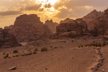 Sunset landscape with sandstone rocks in little petra archaeological site, Jordan