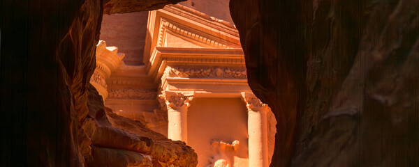 Petra, Jordan frame banner view of Siq walls and the Treasury, Al Khazneh, one of the new Seven...