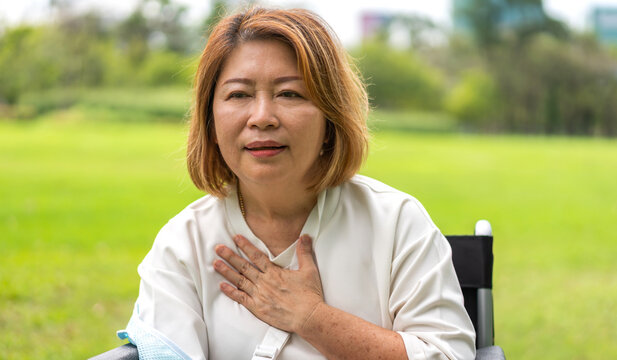 Sick senior women touching neck unwell coughing with sore throat pain,lung cancer,bronchitis,Bronchial Asthma,Tuberculosis,pneumonia,covid-19,eco air pollution pm2.5.insurance and hospital