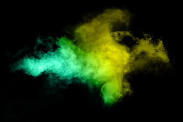 Green and yellow spray paint illustration hit using brush on black background.