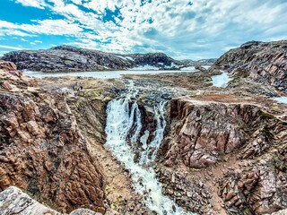 Waterfall of Small Battery Lake in Teriberka,  Kolsky District of Murmansk Oblast, Russia, located on the Barents Sea coast.