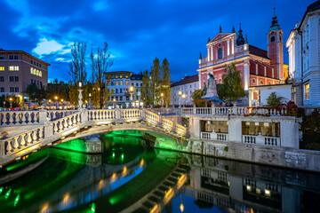 Fototapeta na wymiar Ljubljana, Slovenia - Triple bridge and Franciscan Church of the Annunciation