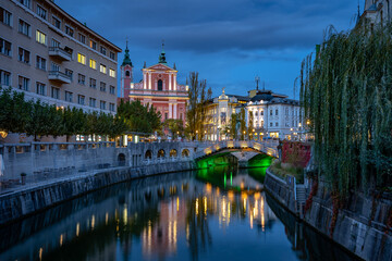 Ljubljana, Slovenia - Ljubljanica river canal, Triple bridge and Franciscan Church of the Annunciation
