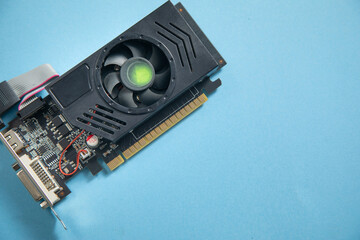 Computer graphics card on the blue background.