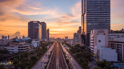 Aerial view of a subway train on a suspended railroad in Bangkok downtown, Sky train is fastest transport mode in Bangkok, Thailand, Sky Train is running in downtown of Bangkok.