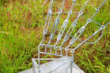 anchor rope slings to stiffen radio and communications towers