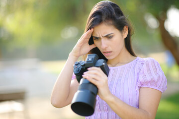 Worried photographer checking result