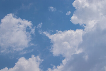 Vibrant Azure Sky and Fluffy Clouds