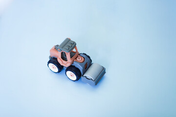 Obraz premium Roller machine. Roll up the asphalt. Flat lay transport ice rink