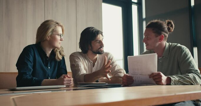 Radiant Office Collaborations: Engaging Dialogues and Blissful Laughter among the Blonde Woman and Two Gentlemen