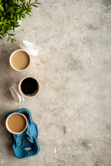 Fototapeta na wymiar Many paper cups with coffee. Coffee to go background
