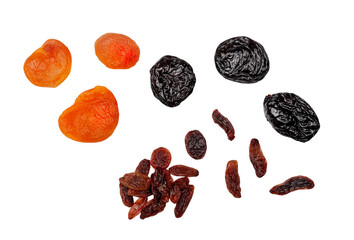 Prunes, dried apricots, raisins isolated on white, top view