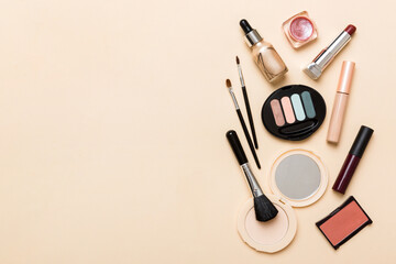 Professional makeup tools. Top view. Flat lay. Beauty, decorative cosmetics. Makeup brushes set and color eyeshadow palette on table background. Minimalistic style