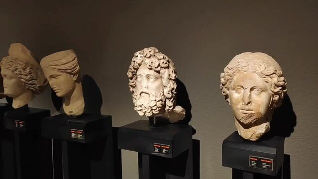 Antalya, Turkey, May 22, 2023. Ancient antique marble sculptures of people's heads