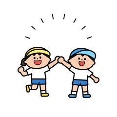 笑顔で手を繋ぐ体操服の子どもたち.