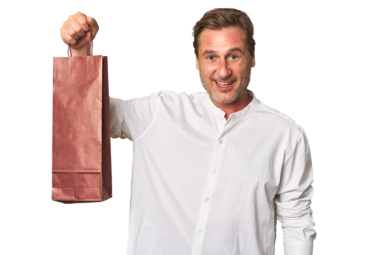 A middle-aged man holding a wine bottle - Powered by Adobe