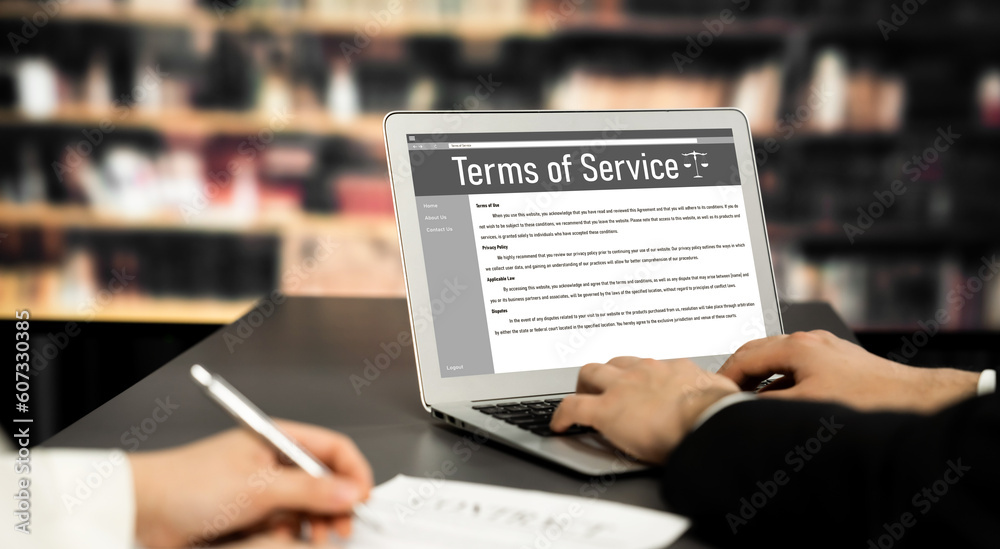 Poster online term of service conditions showing astute rules and regulations in using the website on a lap