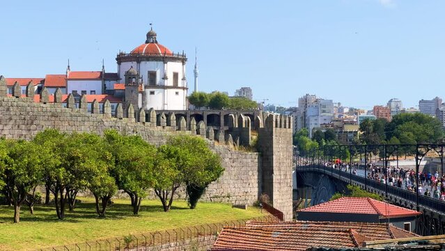 Porto, Portugal. Muralha Fernandina walls next to Luis I Bridge landmark, Douro