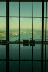 Infinity Swimming Pool with Window View over City and Lake Lucerne in Sunny Day in Lucerne, Switzerland.