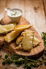 fried zucchinis with marjoram and yogurt sauce