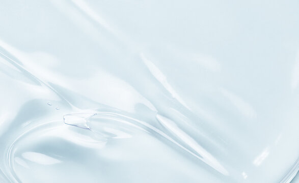 texture background of cosmetic transparent serum for skin and body care