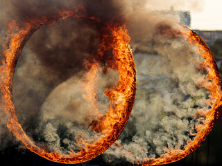 burning metal rings for tricks.