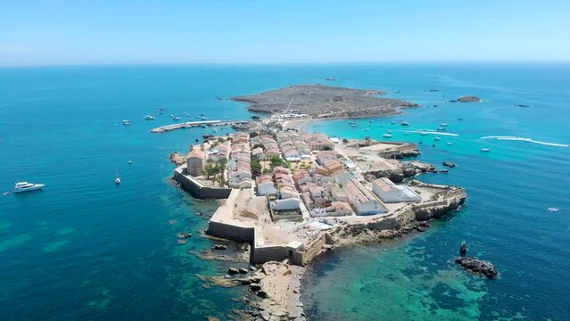 Video of a stunning aerial view of Tabarca Island in the crystal clear waters of Alicante, Spain
