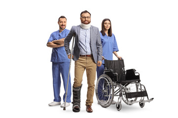 Health care workers with a wheelchair standing behind a man with cervical collar and walking brace