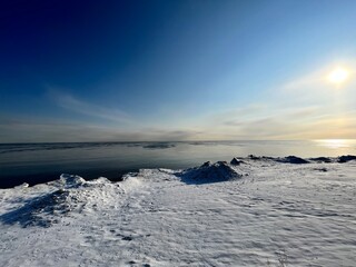 landscape with snow and lake