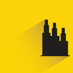 silhouette city building icon with shadow on yellow background