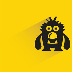 monster with shadow on yellow background
