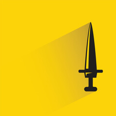 knight sword with shadow on yellow background